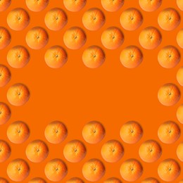 Image of Frame of tasty fresh ripe oranges on orange background, top view. Space for text