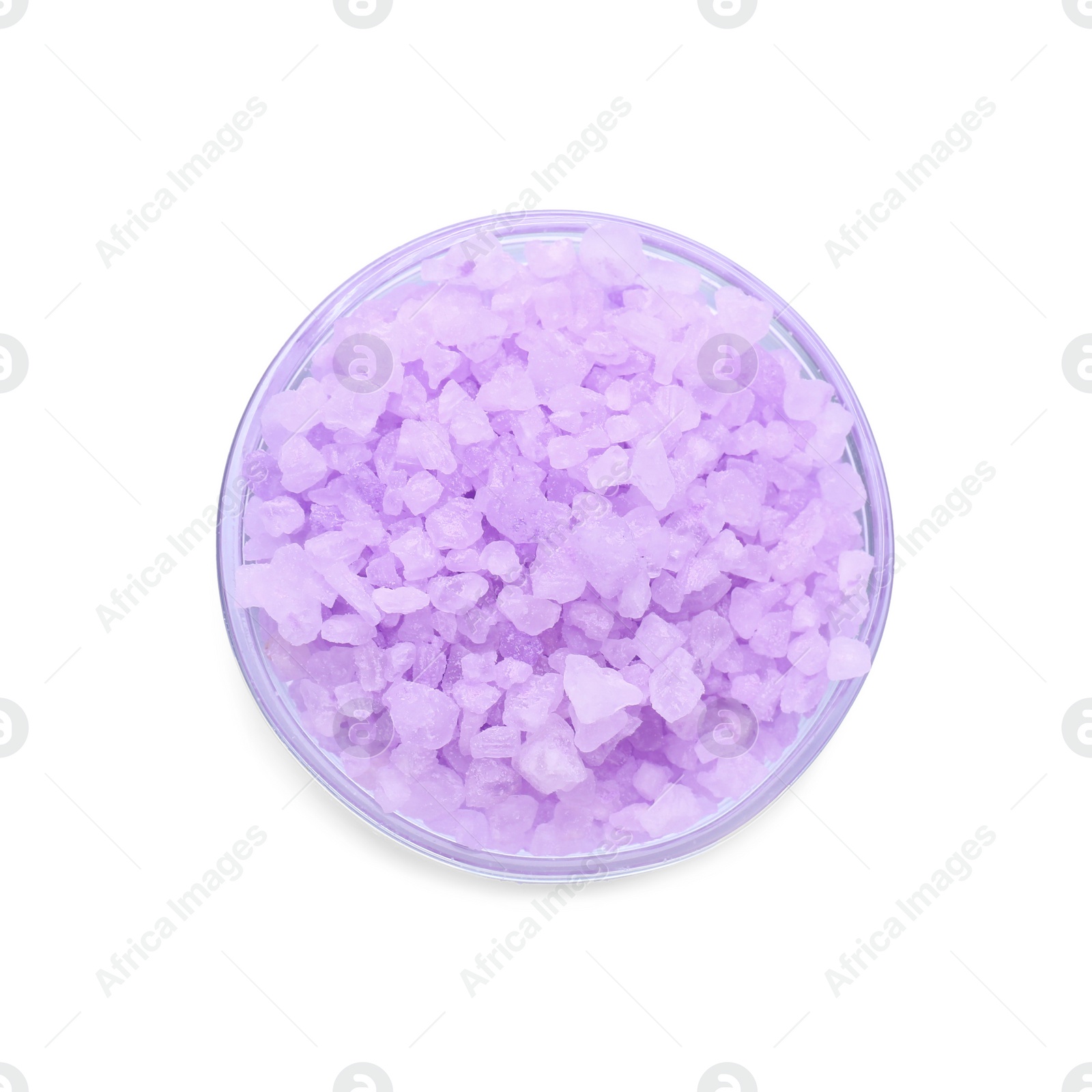 Photo of Glass bowl with violet sea salt isolated on white, top view