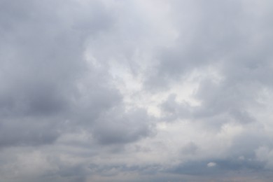 Photo of Sky with heavy rainy clouds on grey day