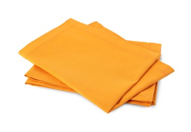 New clean orange cloth napkins isolated on white