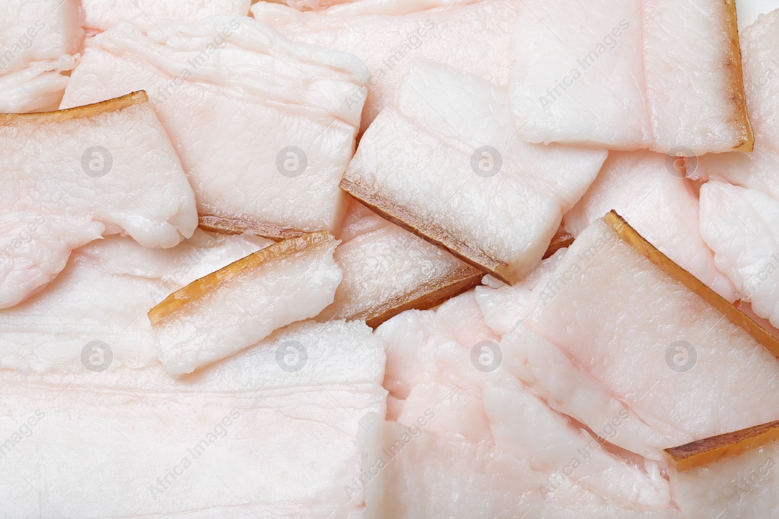 Photo of Pieces of tasty salt pork as background, top view