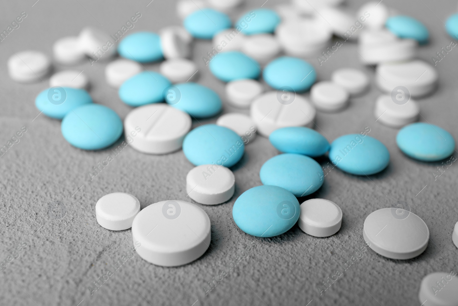 Photo of Many different pills on table, closeup