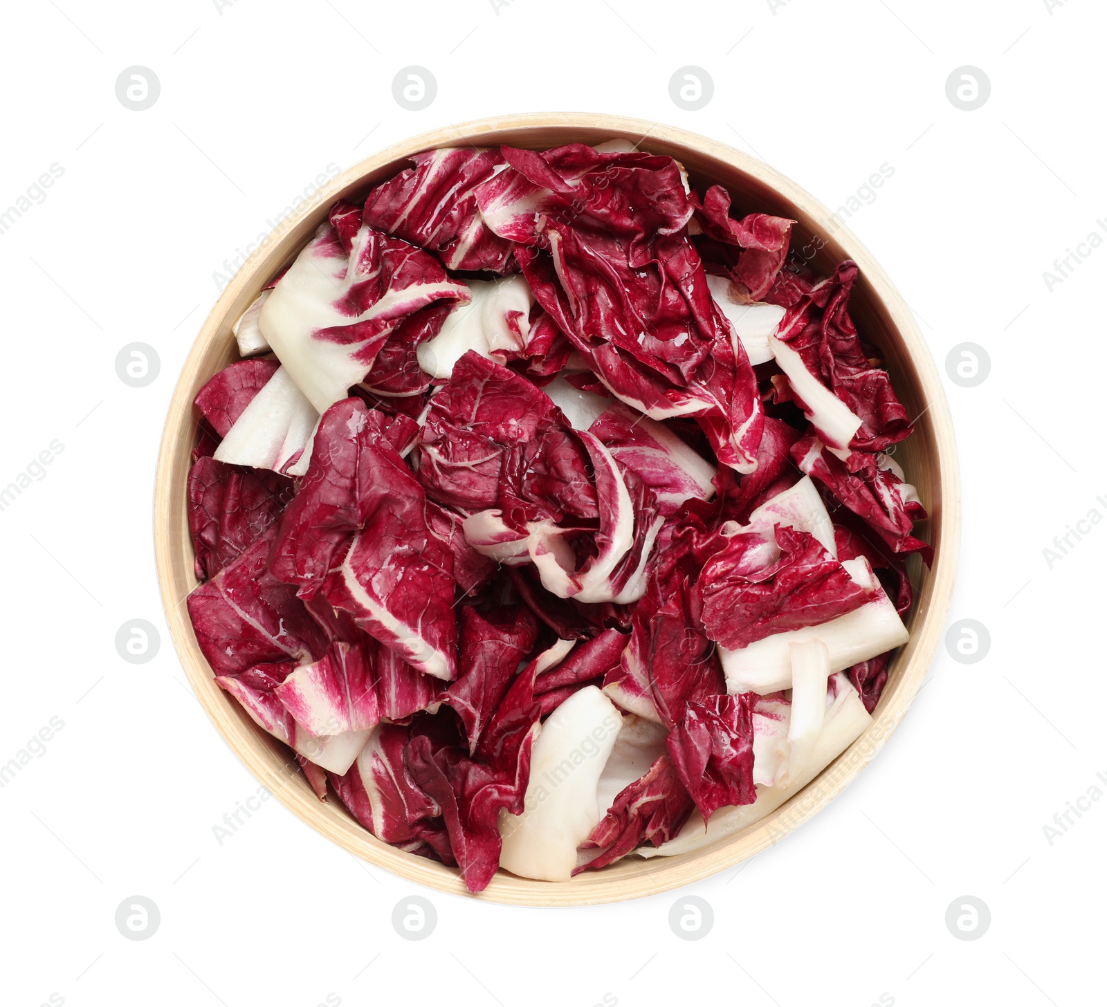 Photo of Leaves of ripe radicchio in bowl on white background, top view