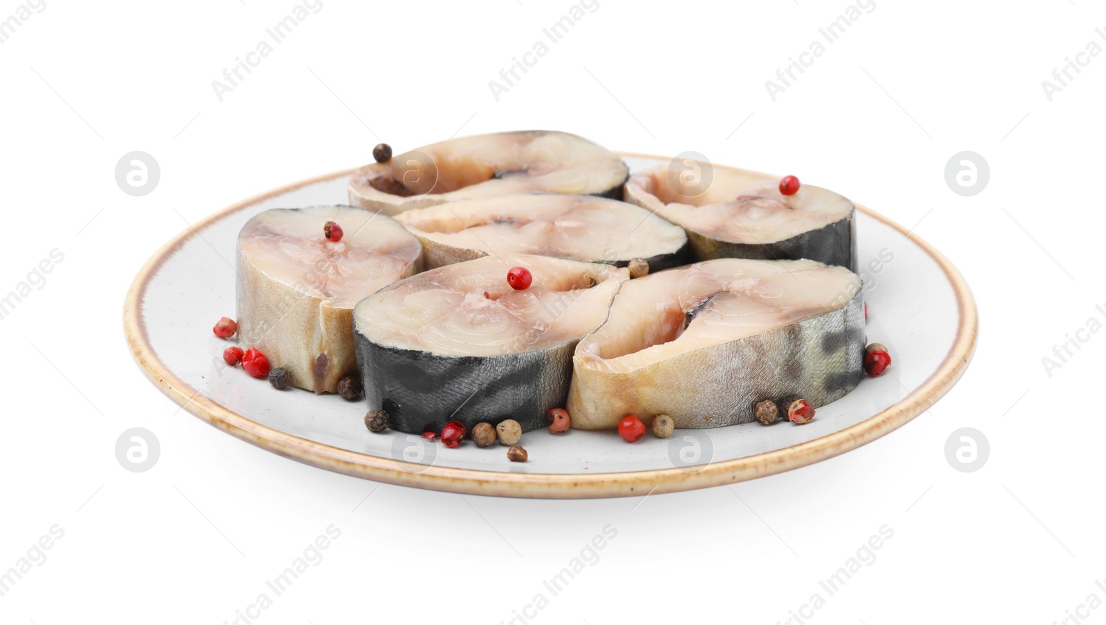 Photo of Pieces of mackerel fish with spices on white background