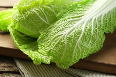 Photo of Fresh ripe Chinese cabbage on table, closeup