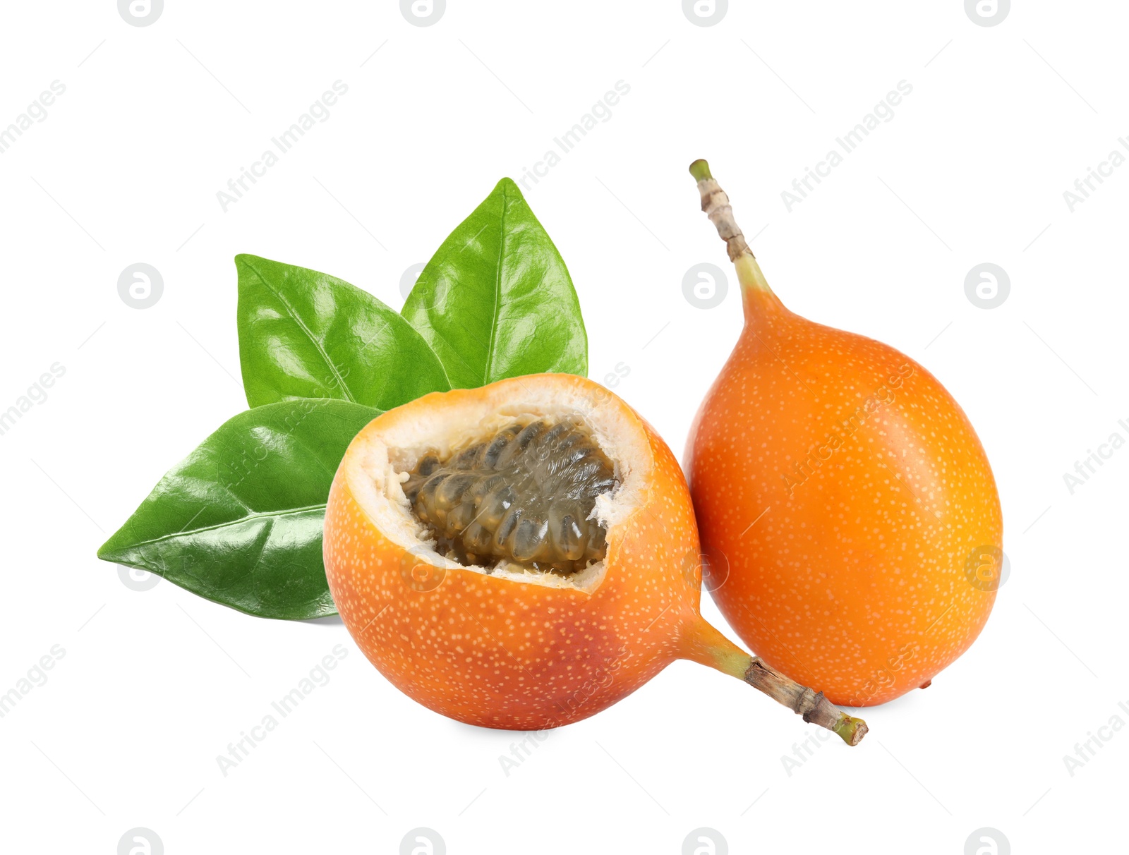 Image of Tasty ripe granadillas and green leaves on white background