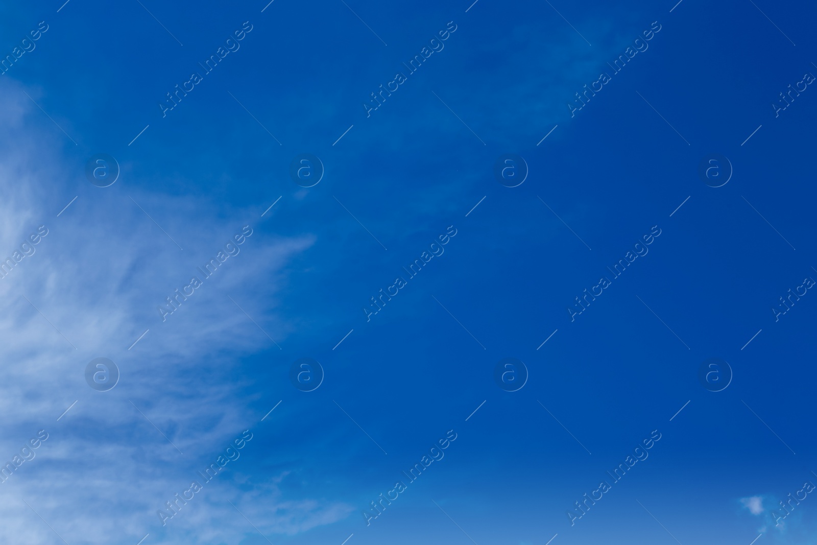 Photo of Picturesque blue sky with white clouds on sunny day