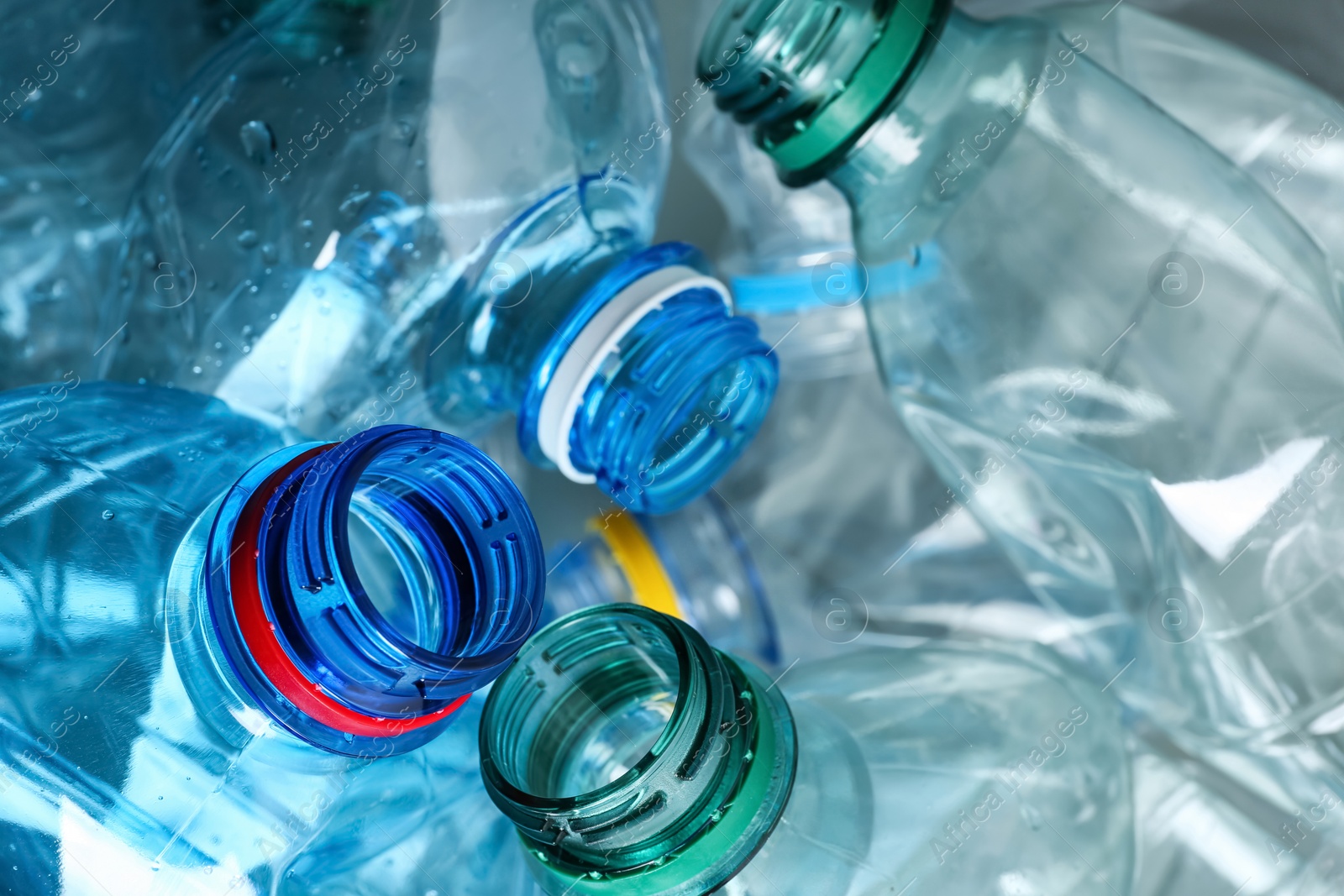 Photo of Many plastic bottles as background, closeup. Recycle concept