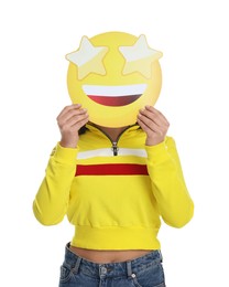 Photo of Woman holding emoticon with stars instead of eyes on white background