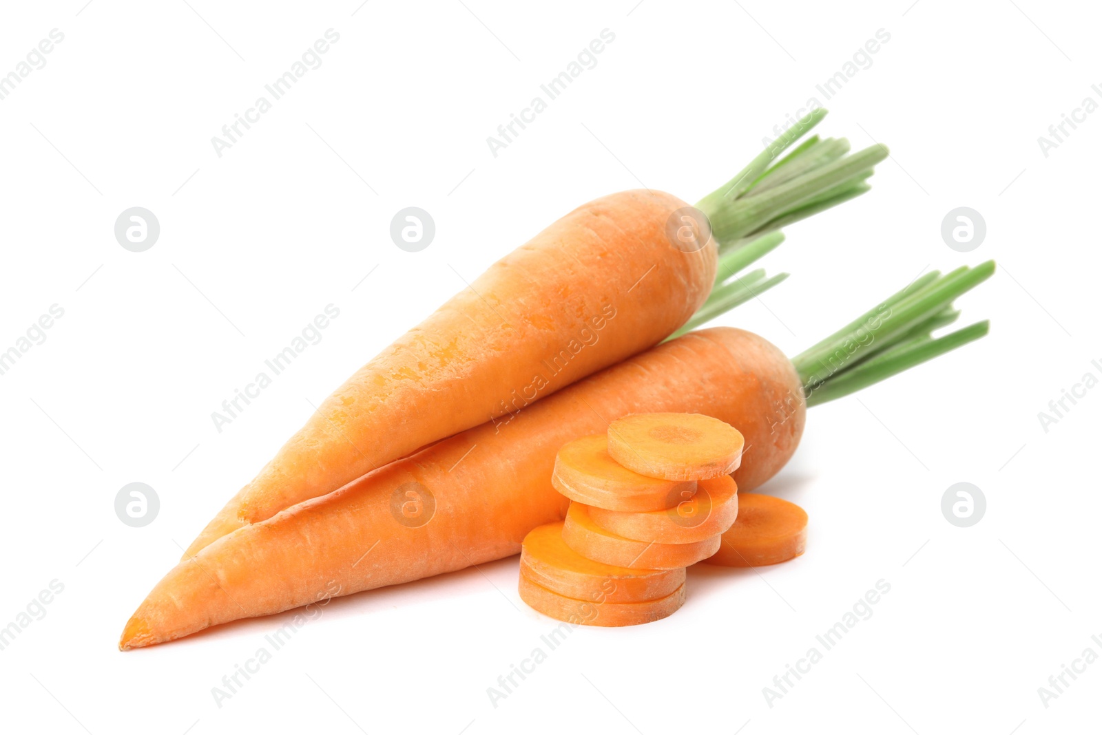 Photo of Whole and cut ripe carrots isolated on white