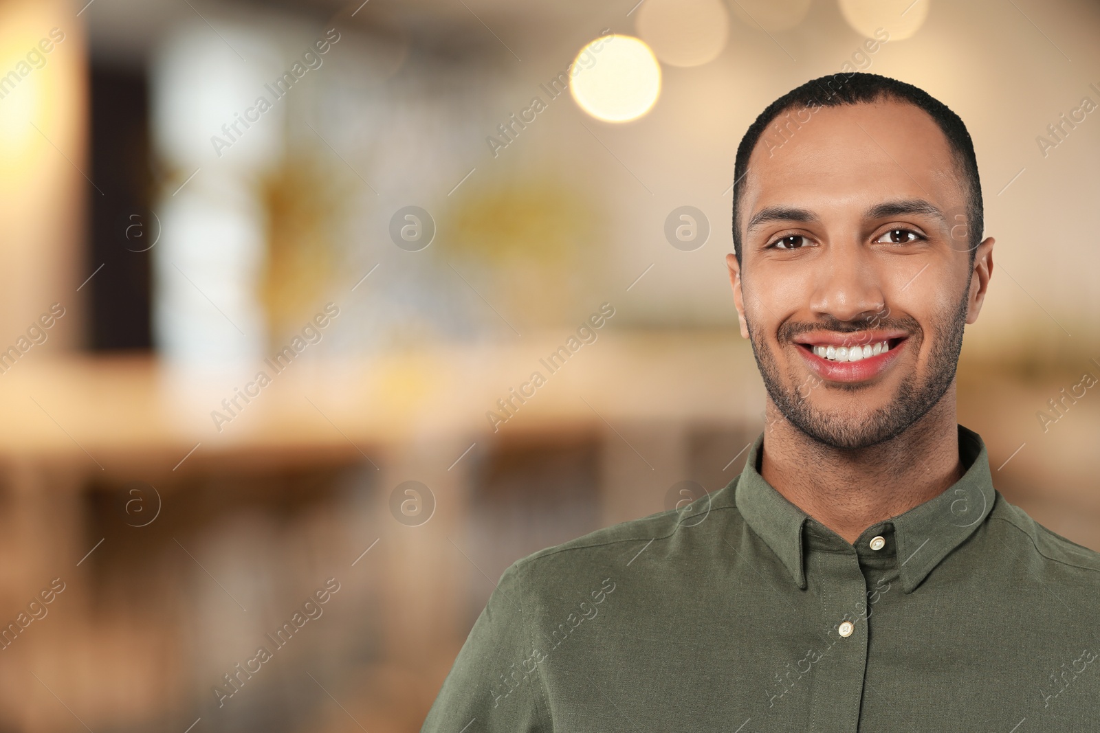 Image of Portrait of handsome confident man in office, space for text