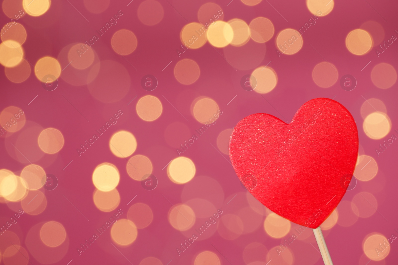 Photo of Decorative heart against pink background, space for text. Valentine's Day