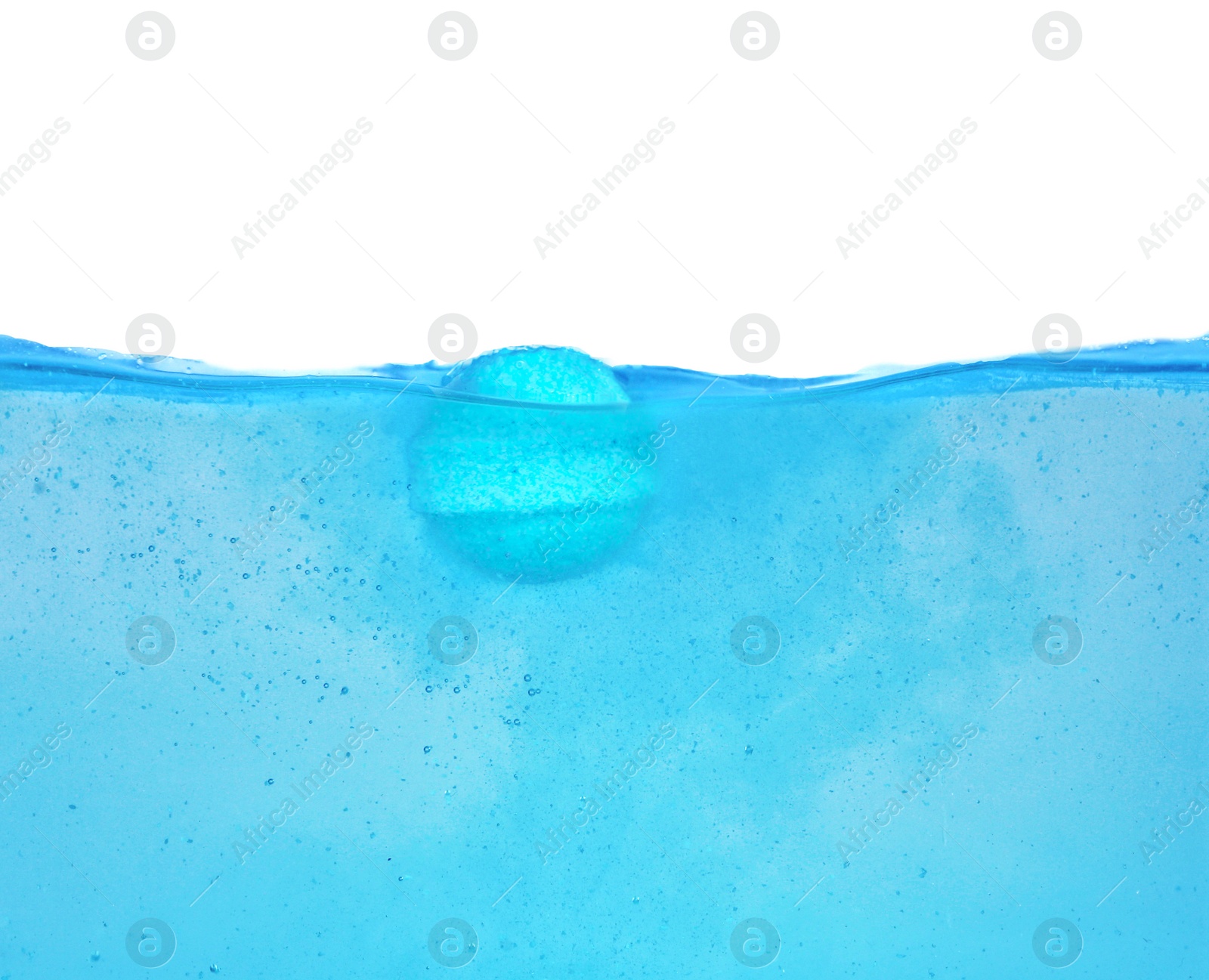 Photo of Bath bomb in water on white background