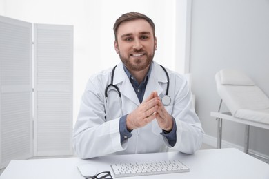 Pediatrician consulting patient using video chat in clinic, view from webcam