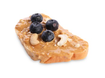 Photo of Toast with tasty nut butter, blueberries and cashews isolated on white