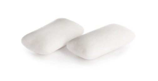 Photo of Two chewing gum pieces on white background