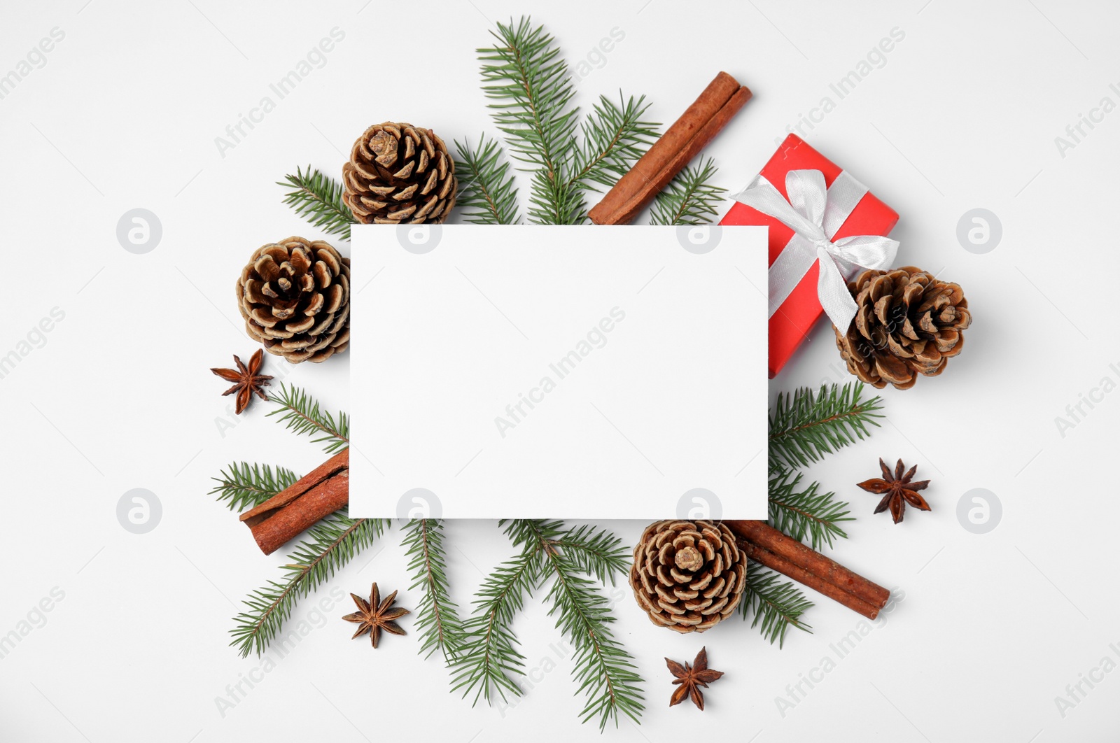 Photo of Beautiful Christmas decor and blank card on white background, flat lay