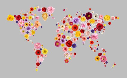 World map made of beautiful flowers on grey background, banner design