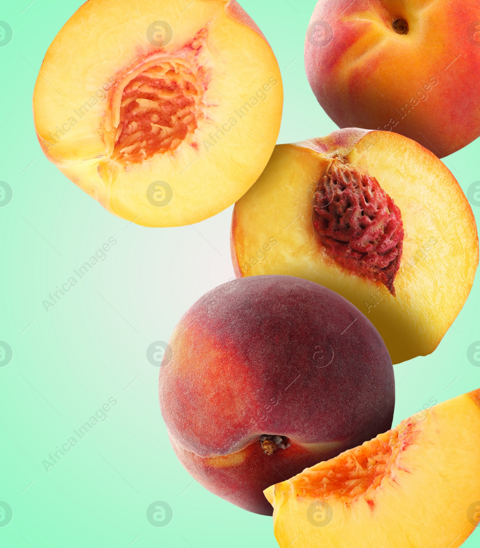 Image of Juicy fresh peaches falling on aquamarine color background