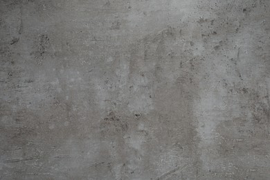Photo of Grey stone surface as background, closeup view
