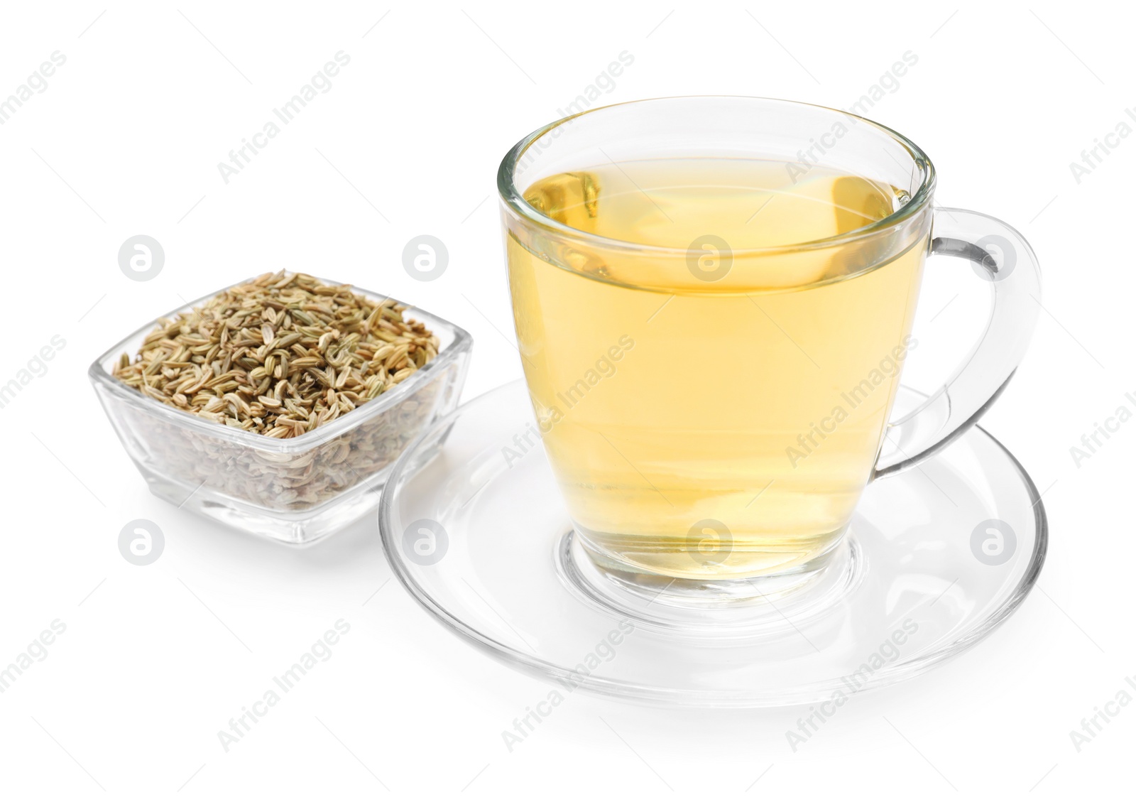 Photo of Aromatic fennel tea in cup and seeds isolated on white