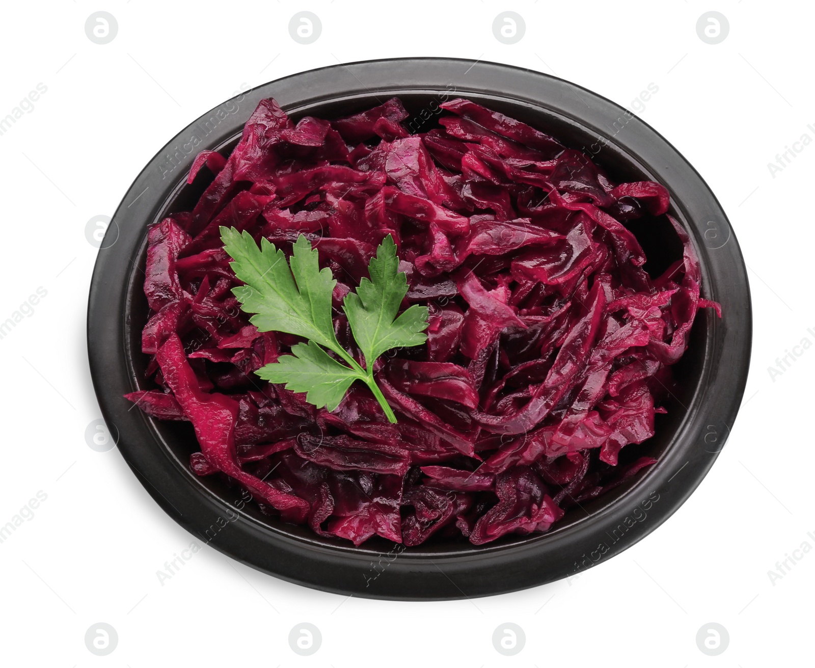 Photo of Bowl of tasty red cabbage sauerkraut with parsley isolated on white, top view