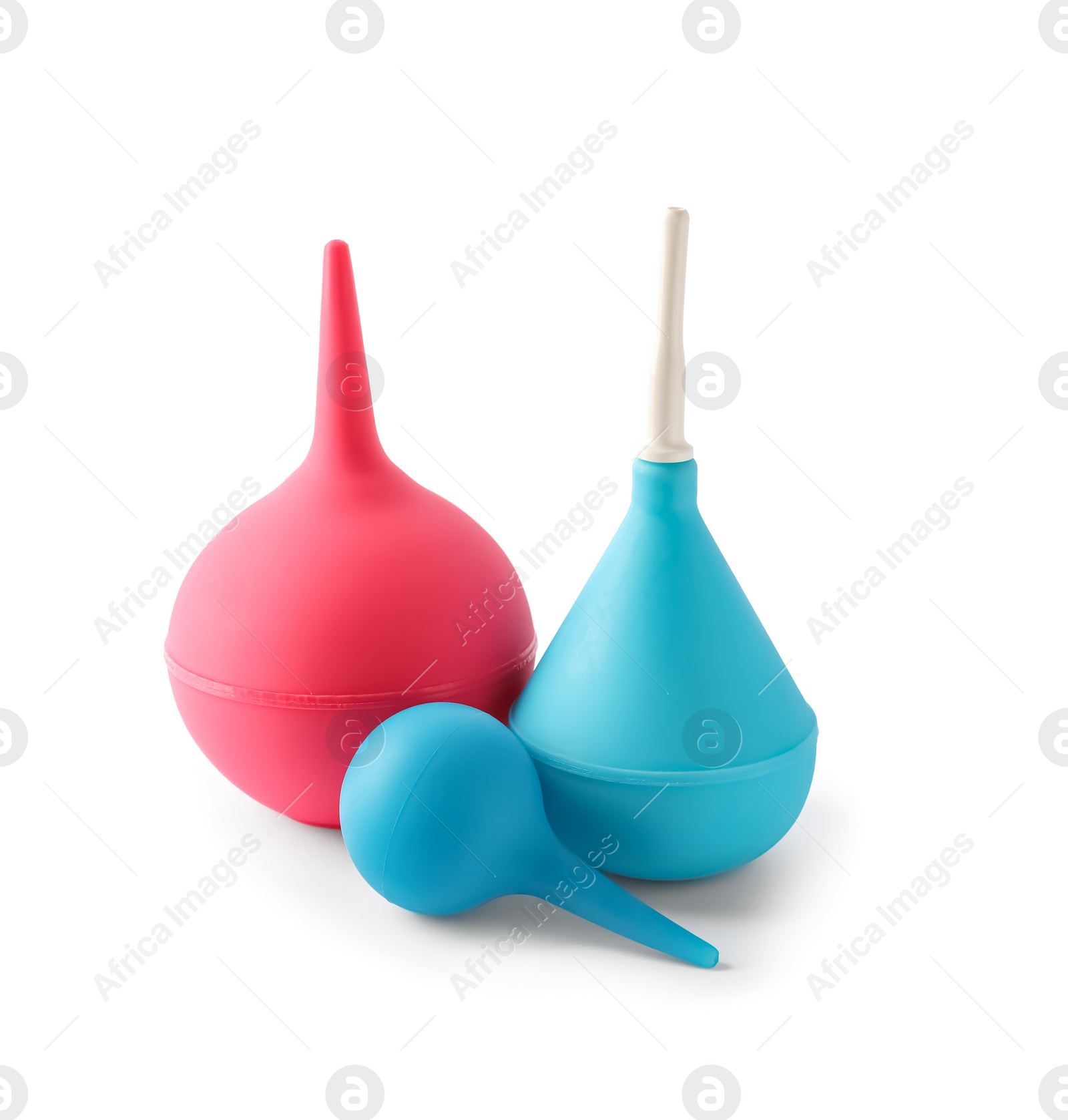 Photo of Different enemas on white background. Medical treatment