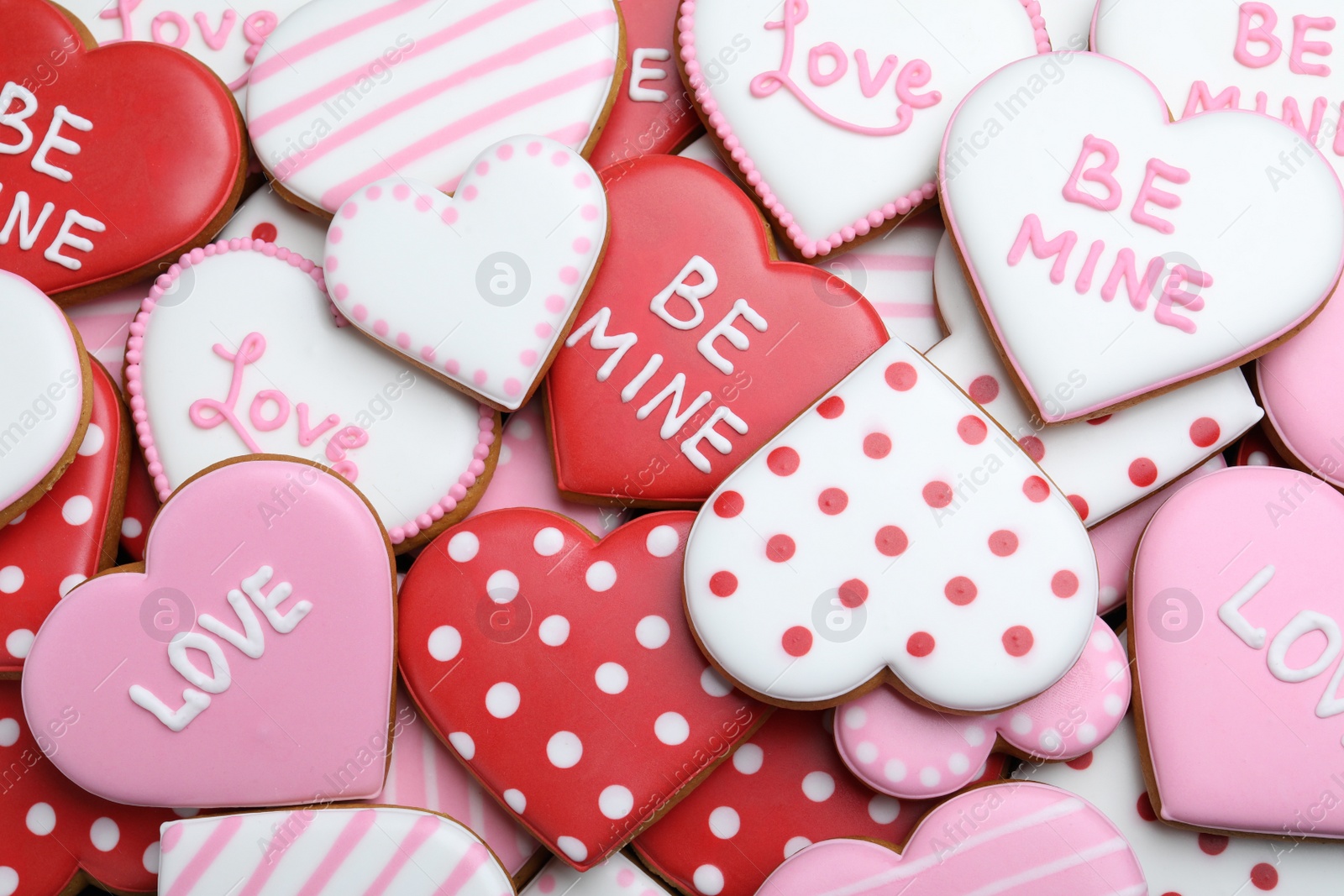 Photo of Delicious heart shaped cookies as background, top view. Valentine's Day