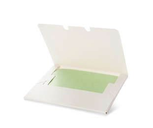 Photo of Package of facial oil blotting tissues isolated on white. Mattifying wipes