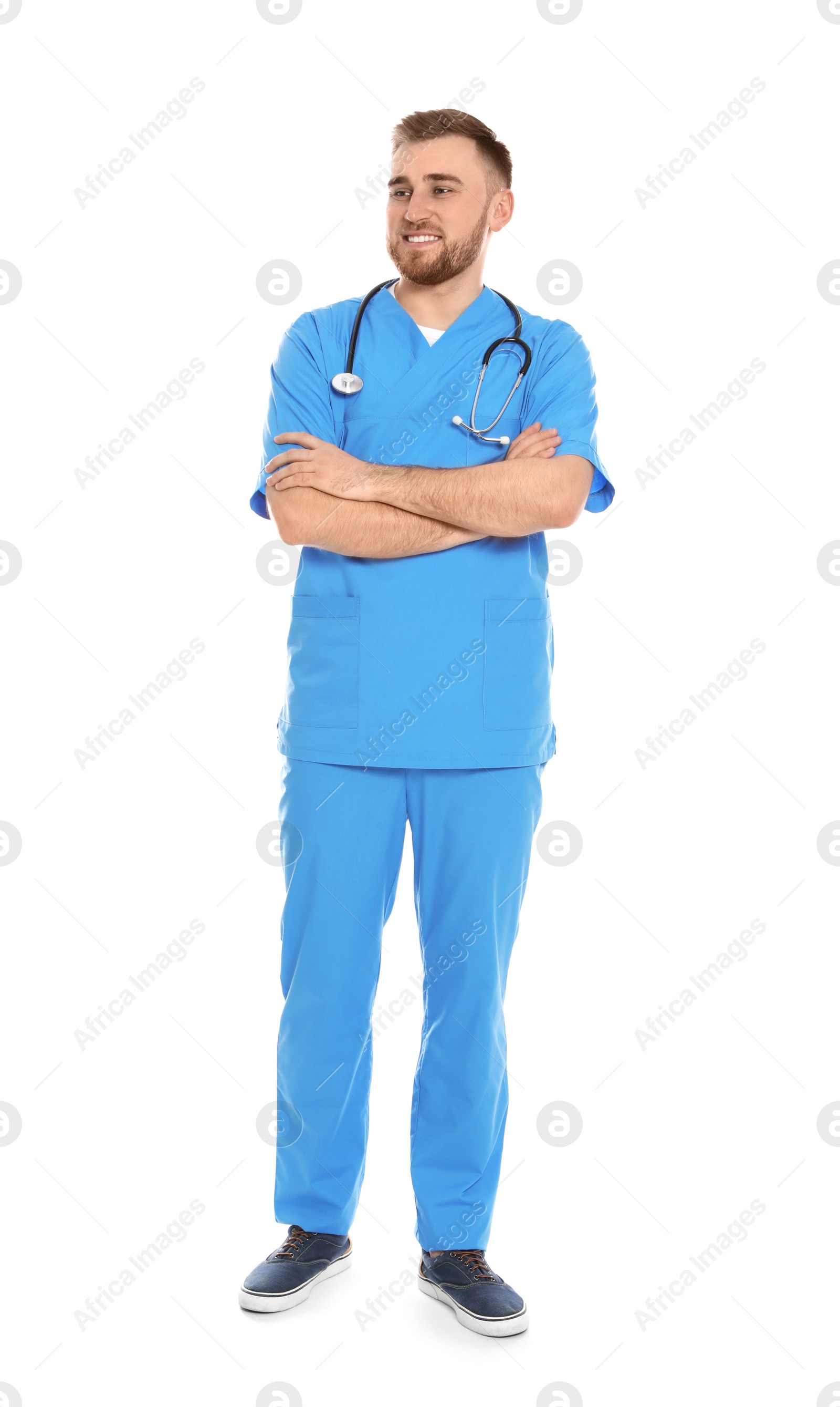 Photo of Full length portrait of medical doctor with stethoscope isolated on white