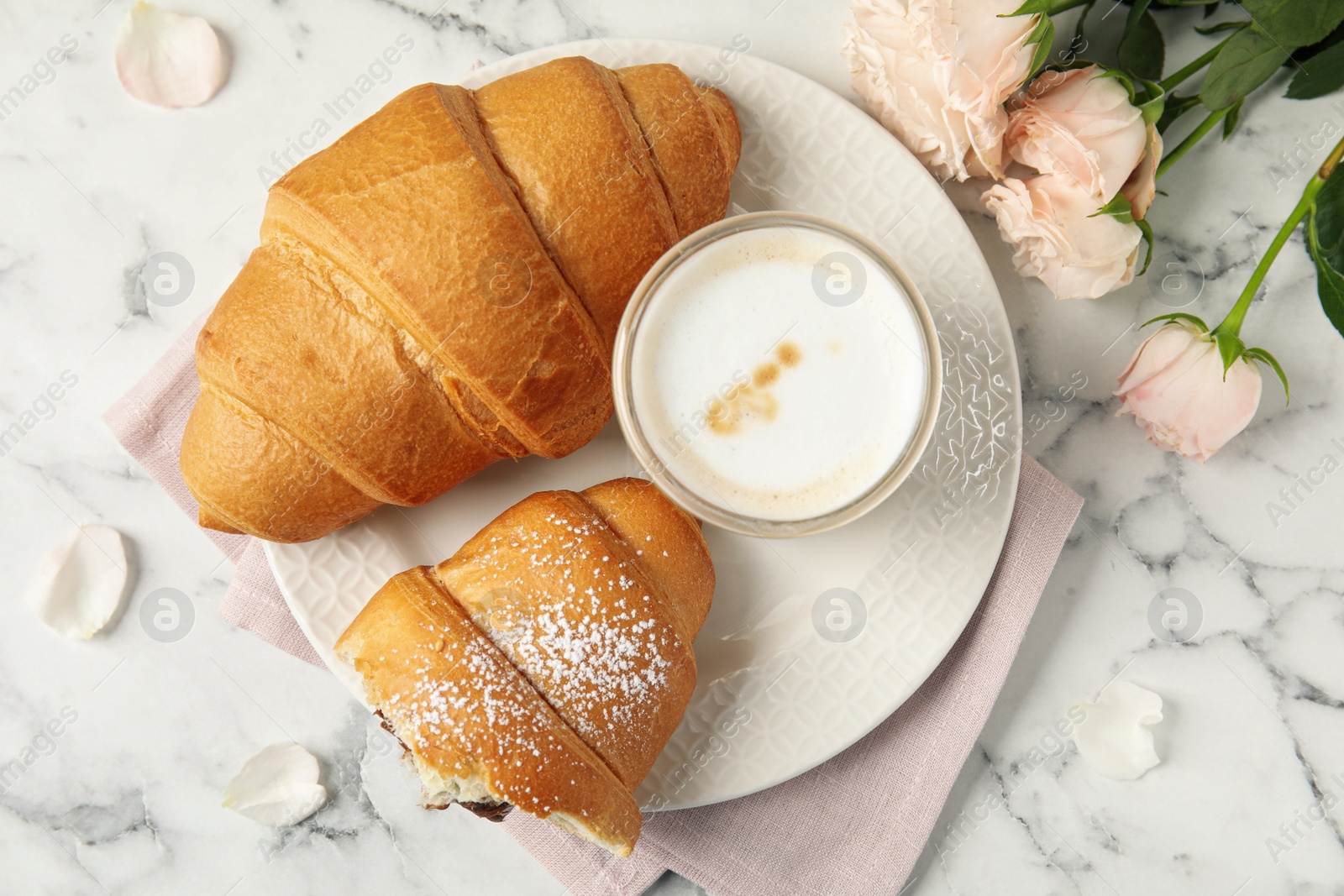 Photo of Flat lay composition with tasty croissants, latte and roses on white marble table