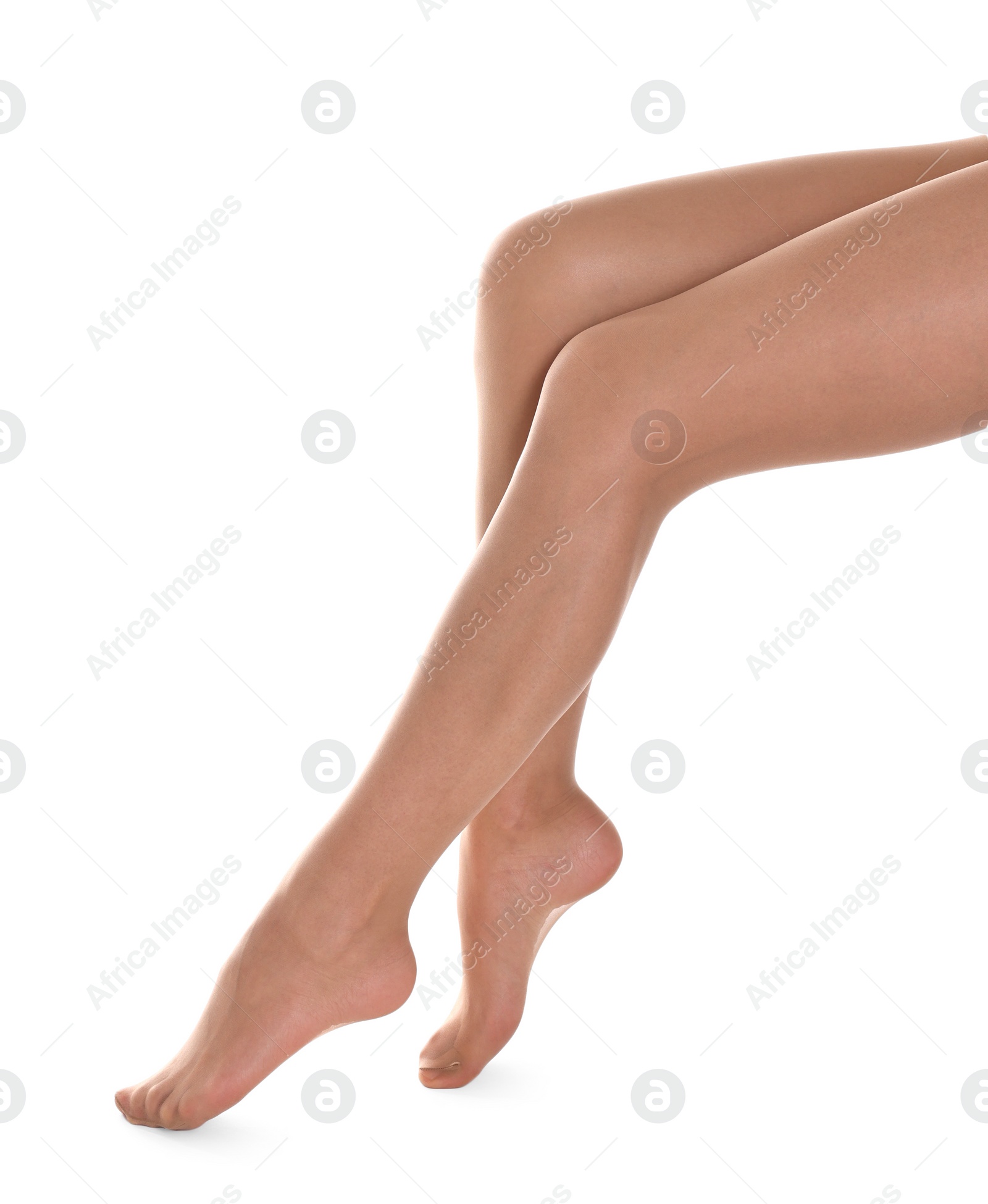 Photo of Woman with beautiful long legs wearing tights on white background, closeup