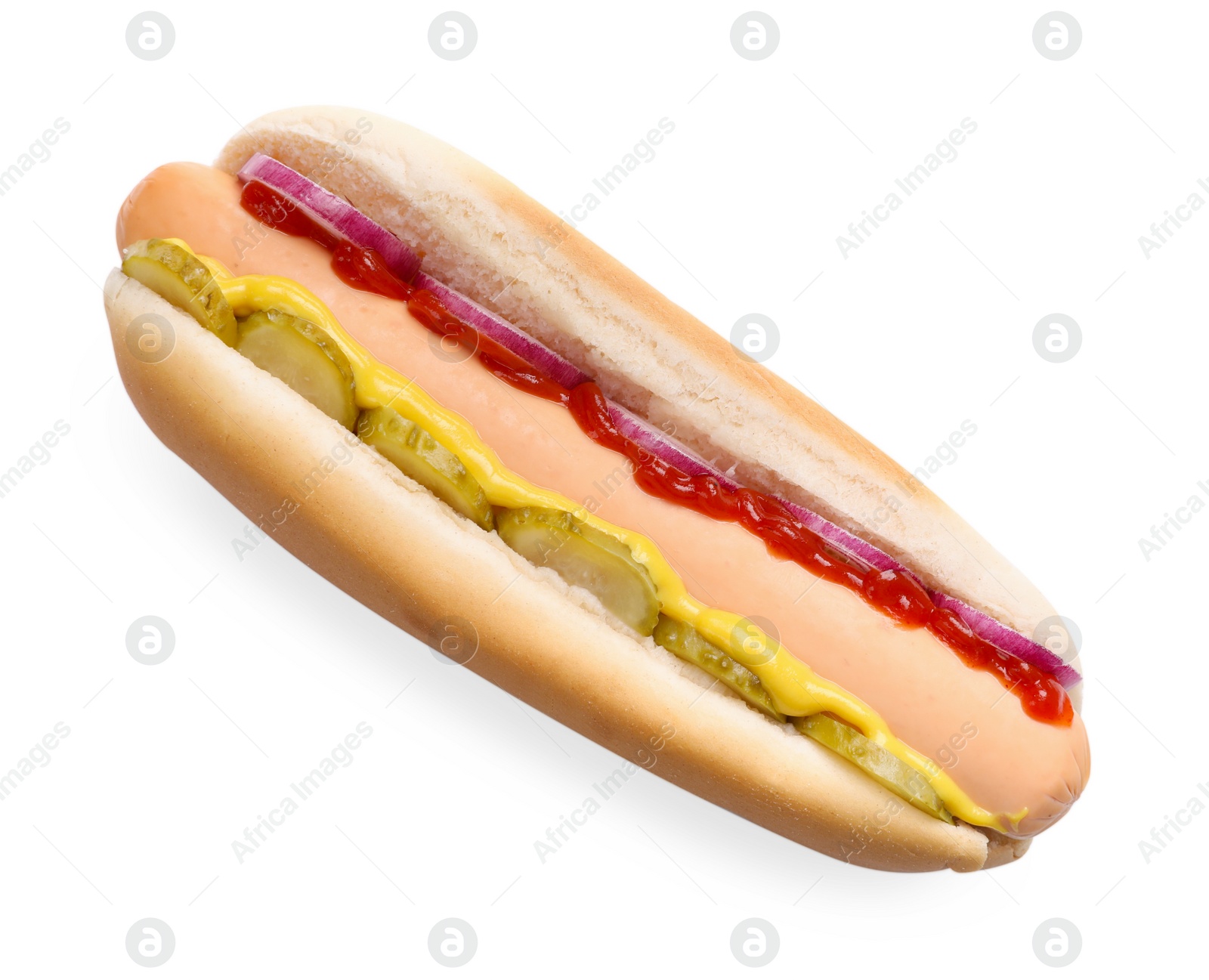 Photo of Delicious hot dog with onion, pickle and sauces isolated on white, top view