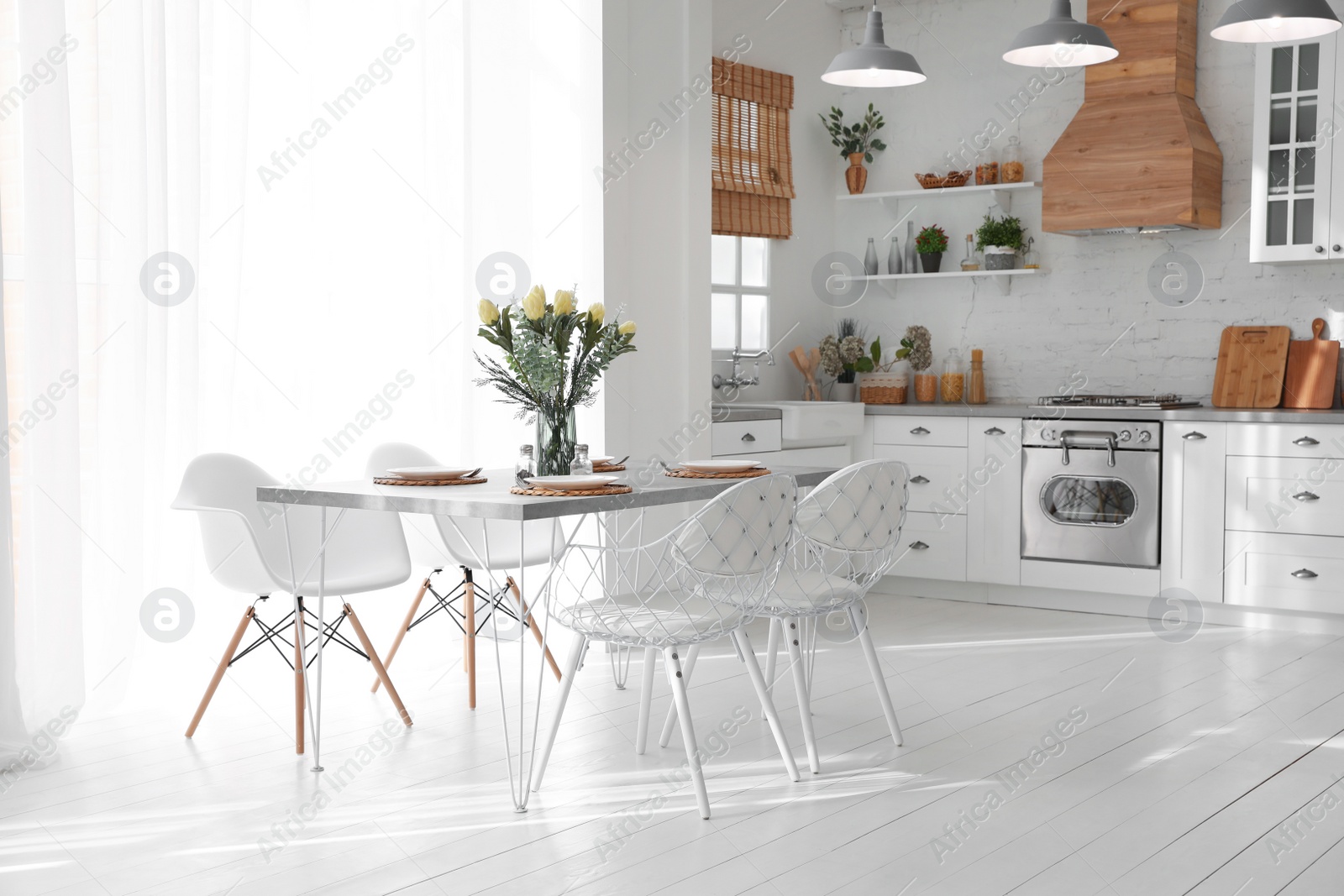 Photo of Beautiful kitchen interior with new stylish furniture