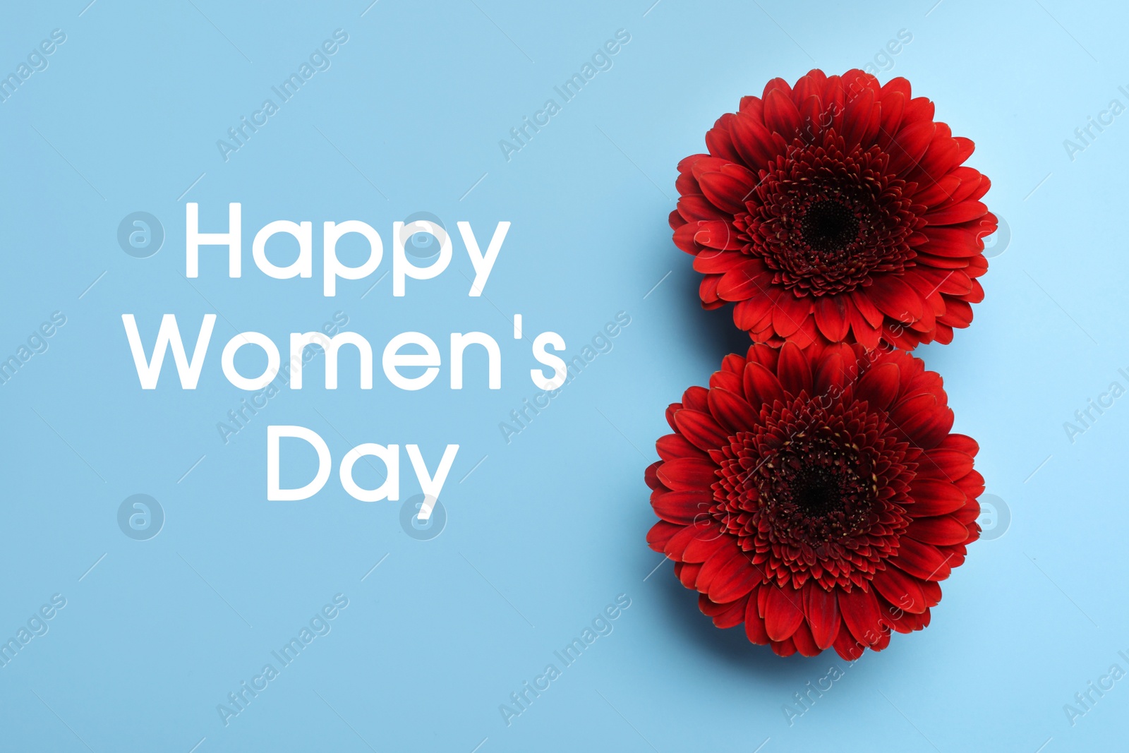 Image of Number 8 made with red gerberas on light blue background, flat lay. Happy Women's day