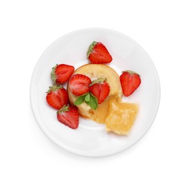 Photo of Tasty vanilla fondant with white chocolate and strawberries isolated on white, top view