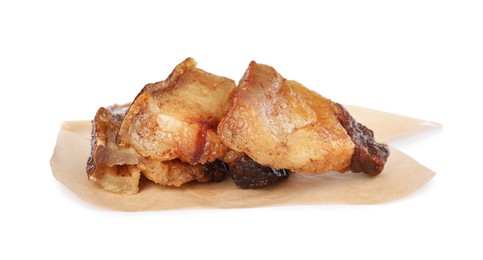 Photo of Tasty fried cracklings on white background. Cooked pork lard