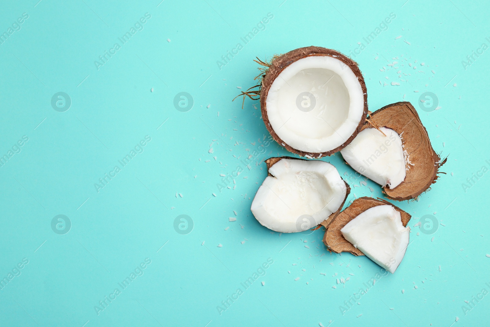 Photo of Composition with fresh coconut on color background, top view