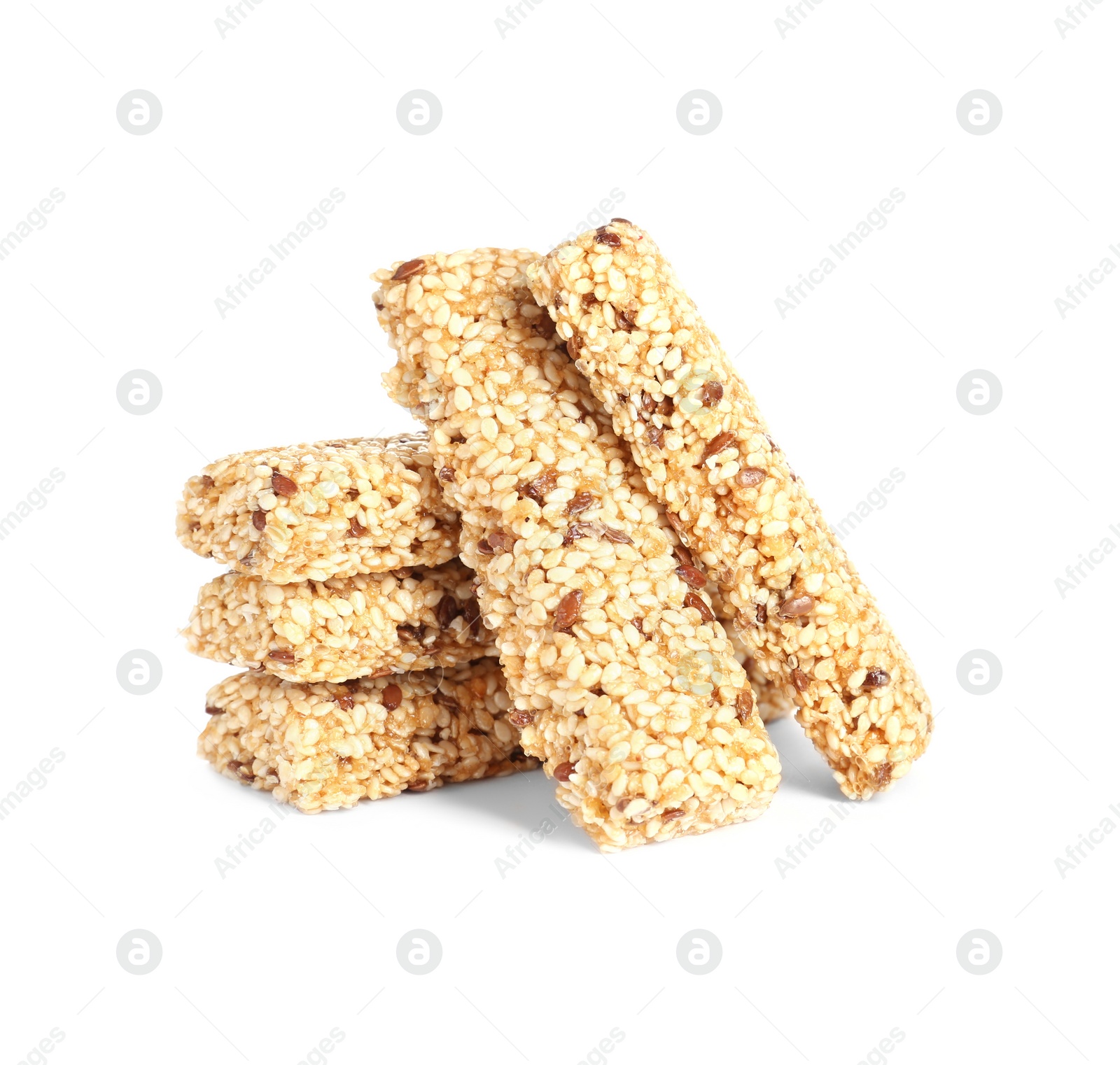 Photo of Tasty sesame seed bars isolated on white