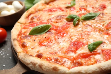 Delicious pizza Margherita on table, closeup view