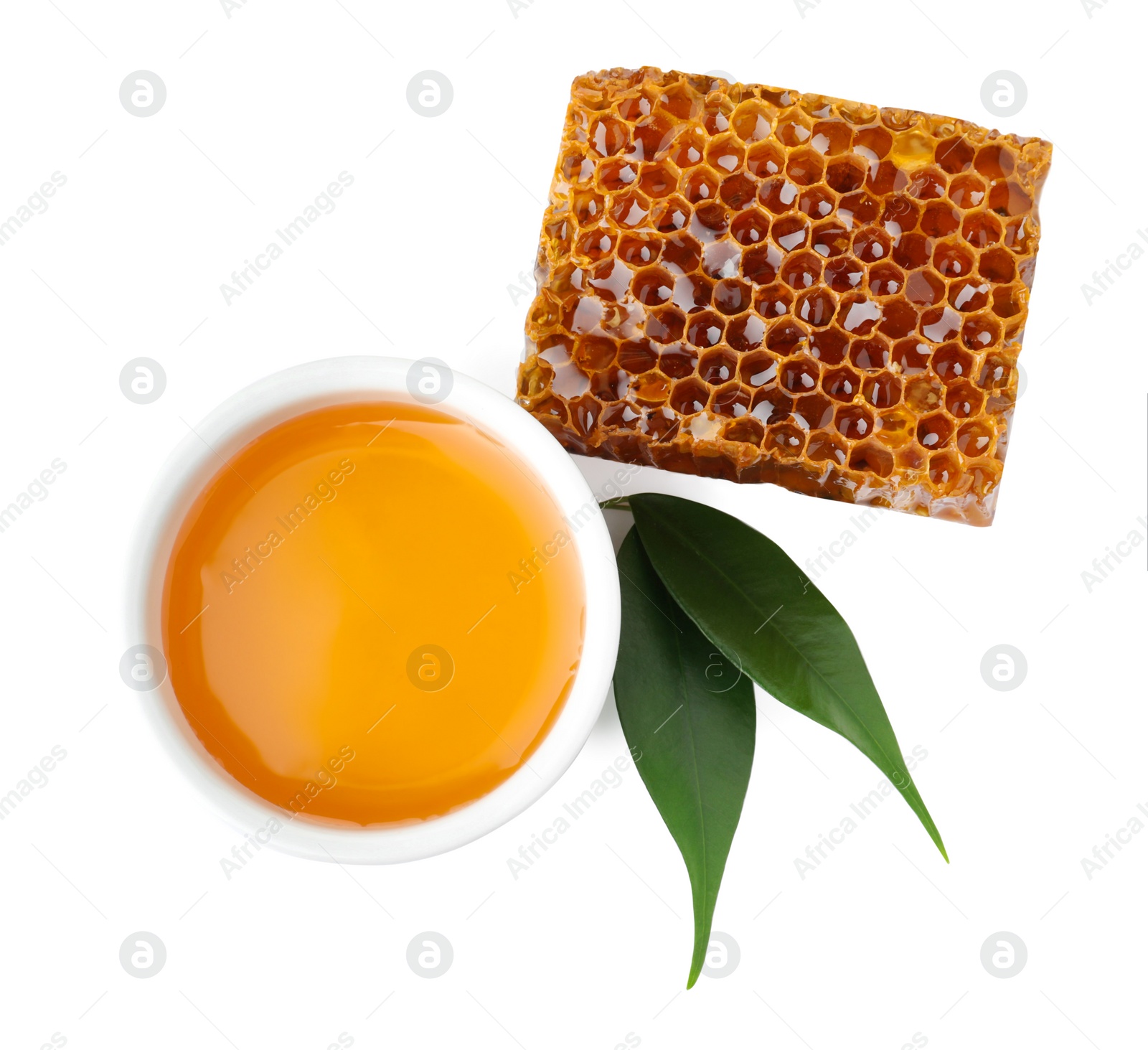 Photo of Composition with fresh honey on white background, top view