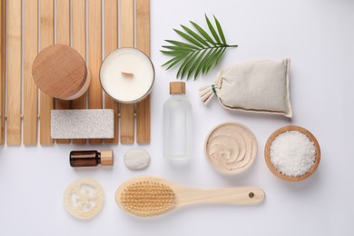 Photo of Flat lay composition with different spa products on white background