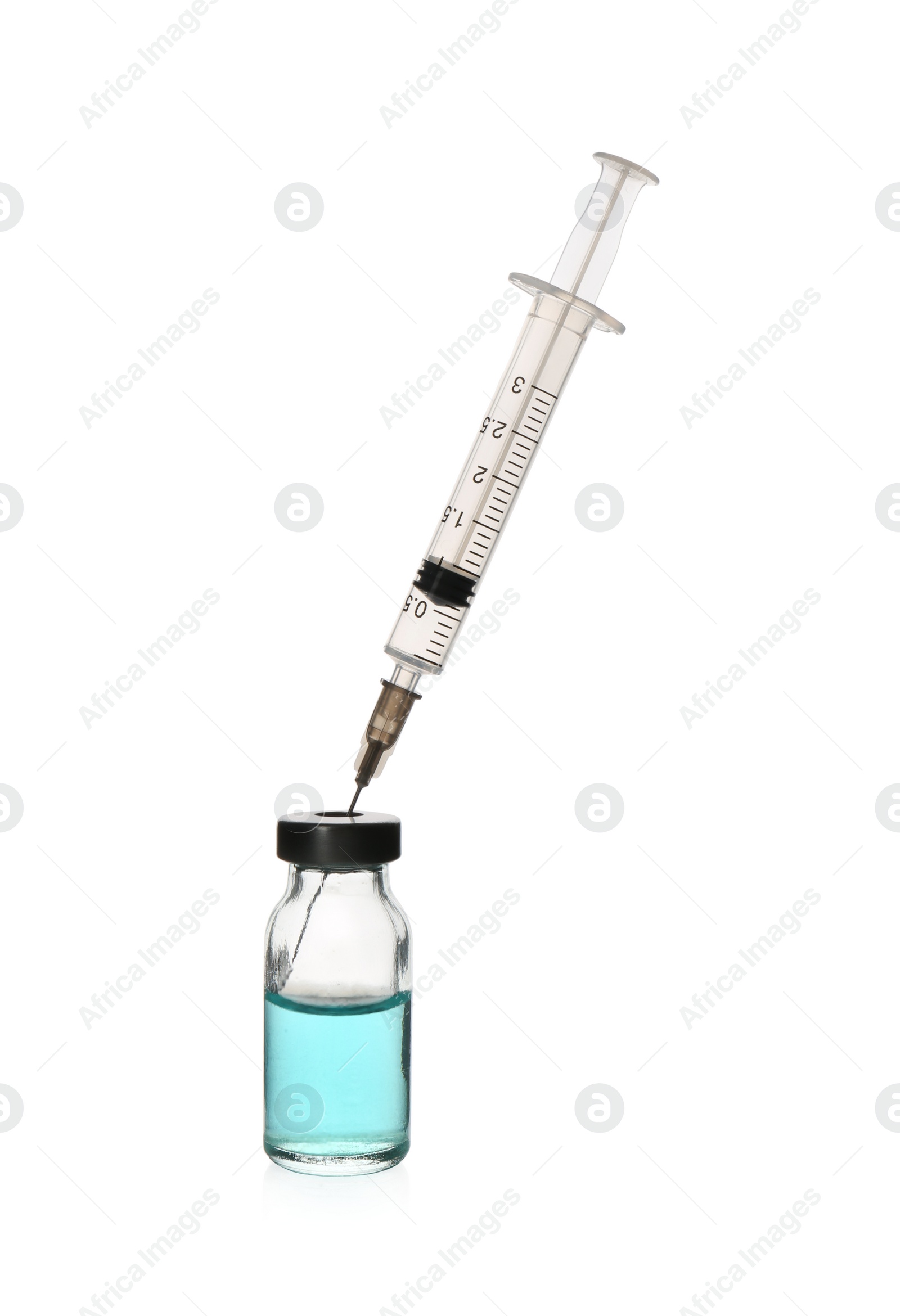 Photo of Syringe with vial of medicine isolated on white