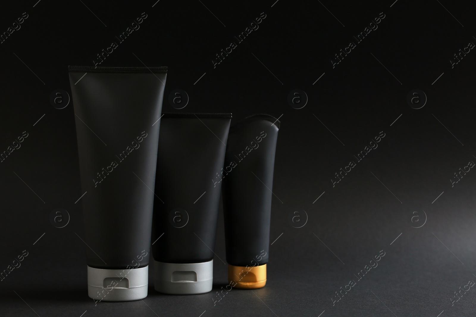 Photo of Set of men's cosmetic on black background. Space for design