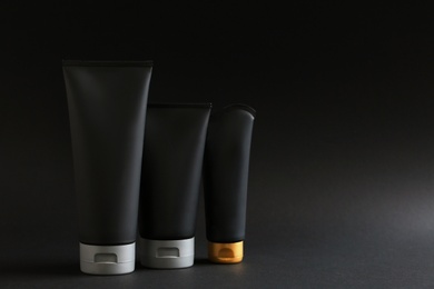 Photo of Set of men's cosmetic on black background. Space for design