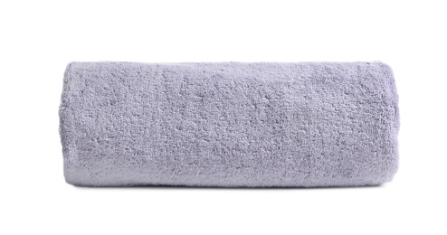 Photo of Rolled soft terry towel on white background