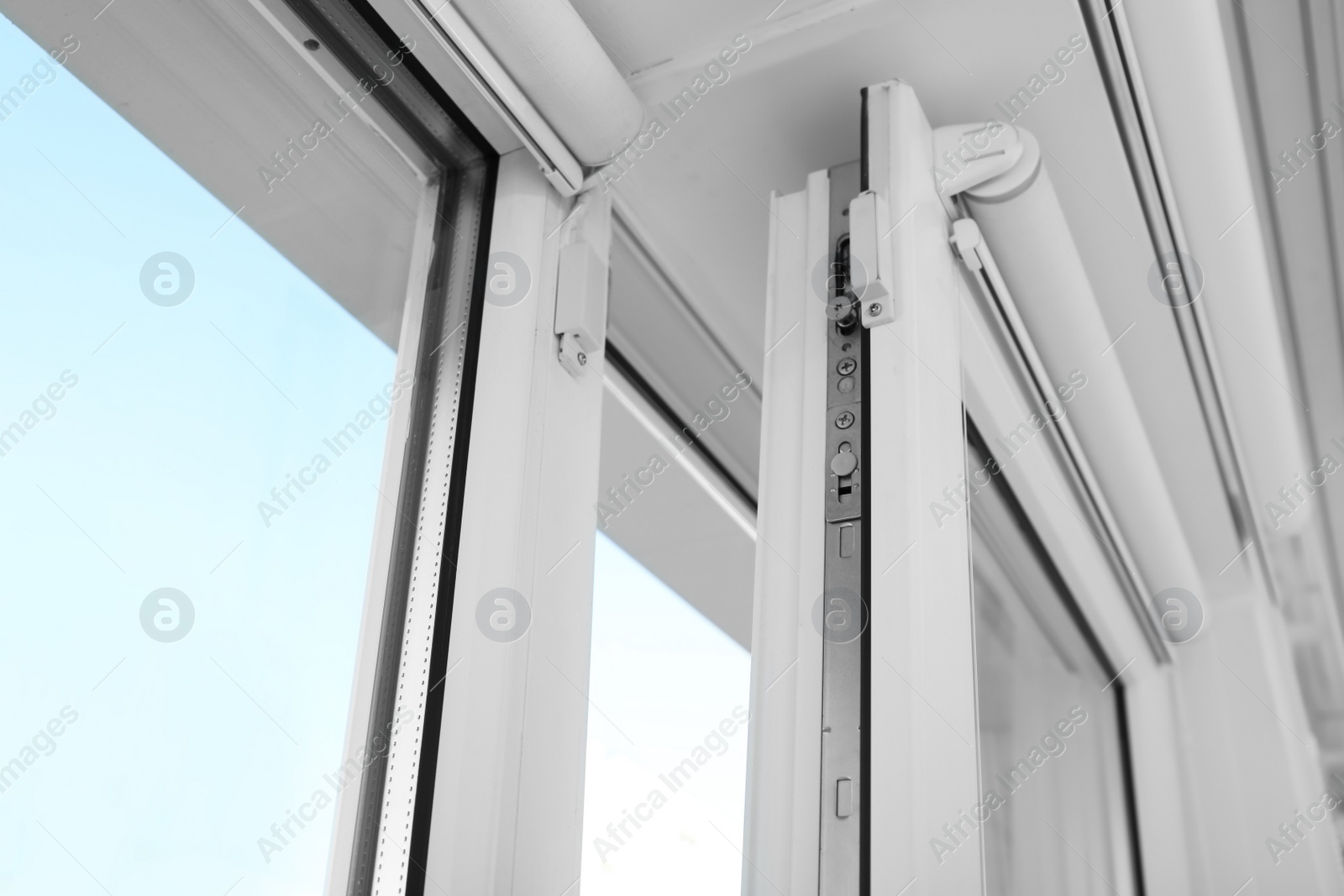 Photo of Modern window indoors, closeup view. Home interior