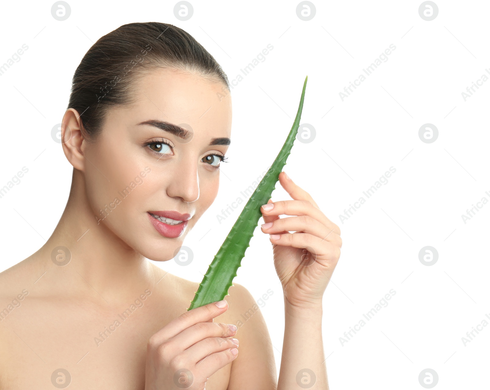 Photo of Young woman with aloe vera leaf on white background