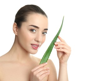 Young woman with aloe vera leaf on white background