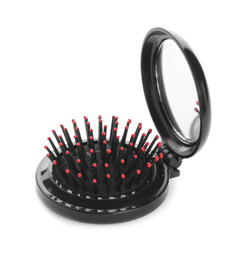 Round folding hair brush with mirror isolated on white